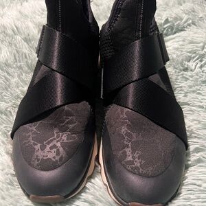 Sorel Women's Black Slip-On Sneakers with Crisscross Straps